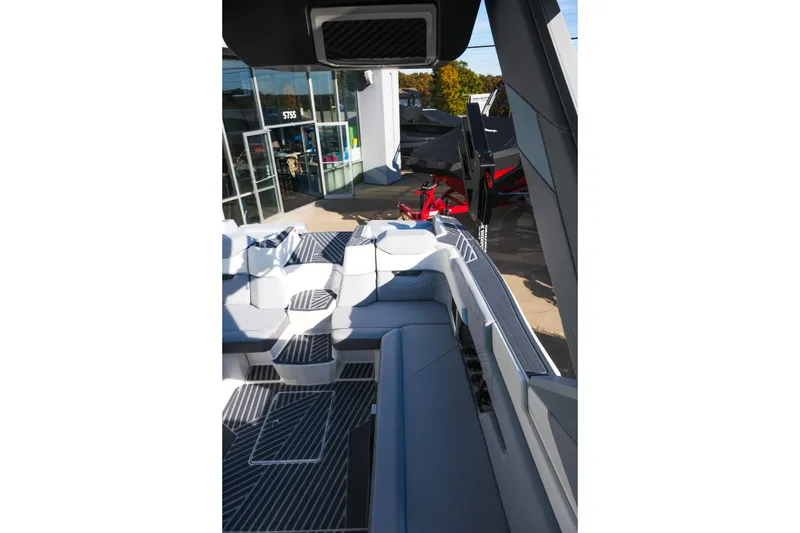 Slide: The Image of 2026 MasterCraft XStar 25 boat interior with modern seating and sleek design. - 20