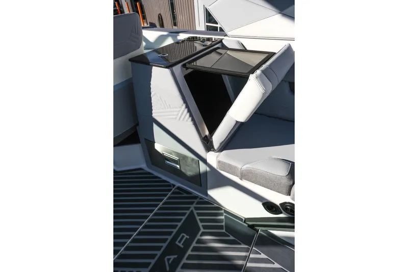 Slide: The Image of 2026 MasterCraft XStar 25 interior with sleek seating and storage features. - 25
