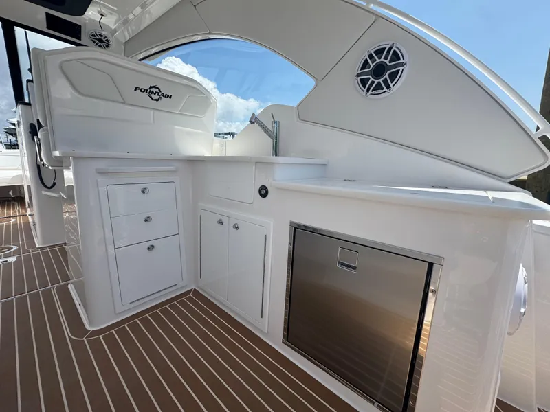 Slide: The Image of 2025 Fountain 39 DX boat interior with sleek cabinetry and modern design. - 8