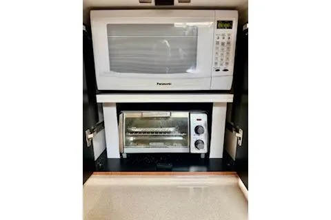 Slide: The Image of Microwave and toaster oven in 2001 Sea Ray Sundancer 540 yacht kitchen. - 11