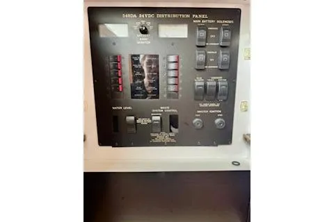 Slide: The Image of 2001 Sea Ray Sundancer 540 electrical distribution panel with switches and indicators. - 12