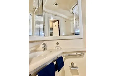 Slide: The Image of Bathroom interior of 2001 Sea Ray Sundancer 540 yacht with mirror and sink. - 21