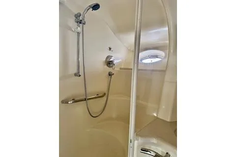 Slide: The Image of Shower area in 2001 Sea Ray Sundancer 540 yacht, featuring sleek design and modern fixtures. - 22