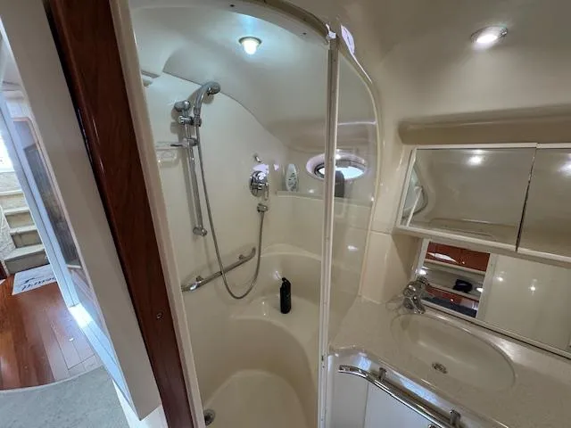 Slide: The Image of Luxurious bathroom in 2001 Sea Ray Sundancer 540 yacht with shower and sink. - 24