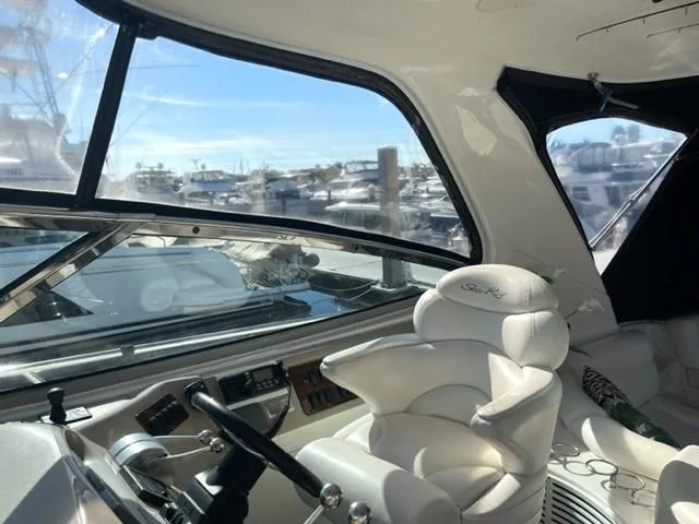Slide: The Image of Interior view of 2001 Sea Ray Sundancer 540 yacht cockpit with luxurious seating. - 36
