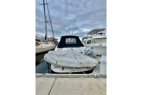 Slide: The Image of 2001 Sea Ray Sundancer 540 docked at marina under cloudy sky. - 4