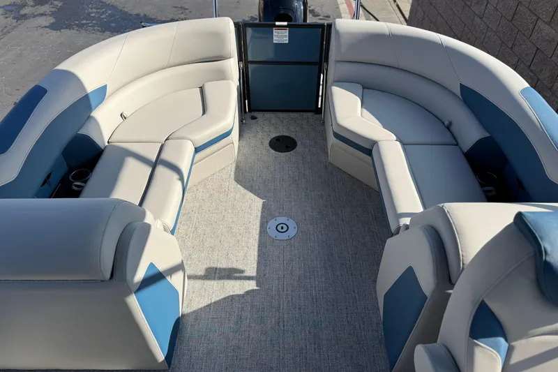 Slide: The Image of 2026 Berkshire 22RFX LE boat interior with plush seating and modern design. - 17
