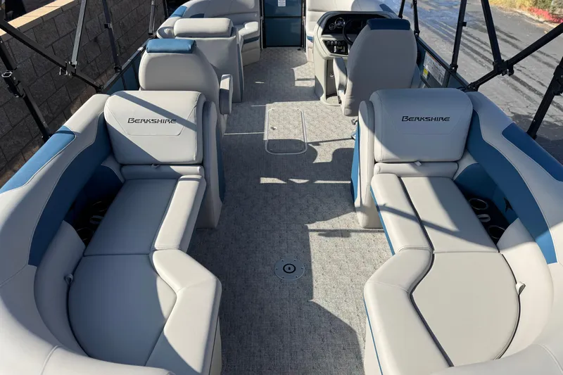 Slide: The Image of 2026 Berkshire 22RFX LE pontoon boat interior with plush seating and modern design. - 21