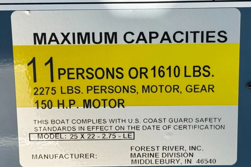 Slide: The Image of 2026 Berkshire 22RFX LE boat capacity label: 11 persons, 1610 lbs, 150 HP motor. - 28