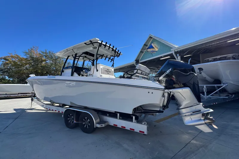 Slide: The Image of 2023 Fountain 34 Tournament Edition boat on trailer, outdoor display. - 15