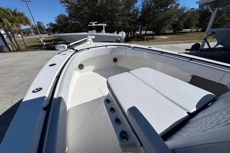 Slide: The Image of 2023 Fountain 34 Tournament Edition boat with spacious seating and sleek design. - 18