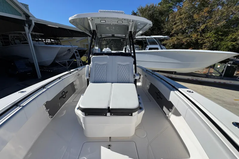 Slide: The Image of 2023 Fountain 34 Tournament Edition boat with sleek seating and modern design. - 24