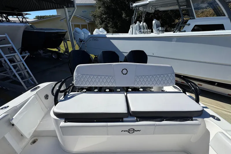 Slide: The Image of 2023 Fountain 34 Tournament Edition boat interior with cushioned seating and sleek design. - 41