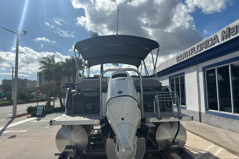 Slide: The Image of 2026 Tahoe Pontoons 23 LTZ Quad Lounge switch at South Florida dealership. - 5