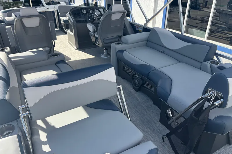 Slide: The Image of 2026 Tahoe Pontoons 23 LTZ Quad Lounge switch interior with luxurious seating and modern design. - 6