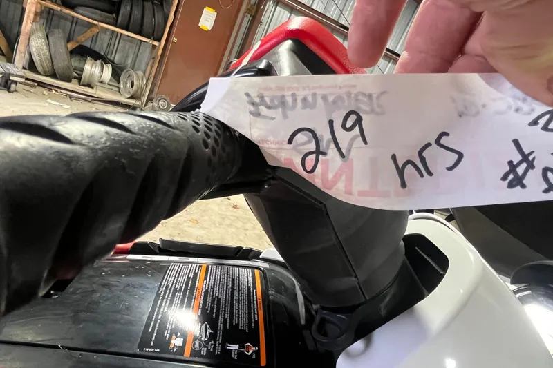 Slide: The Image of 2007 Sea-Doo RXT 215 handlebar with 219 hours usage note. - 4