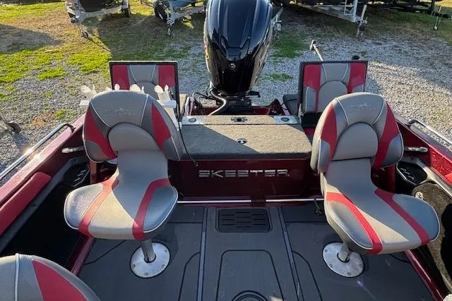 Slide: The Image of 2023 Skeeter Solera 189 boat interior with dual seats and motor. - 14