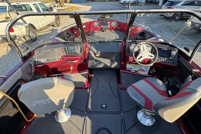 Slide: The Image of 2023 Skeeter Solera 189 boat interior with dual seats and modern dashboard controls. - 15