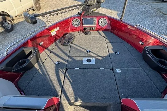 Slide: The Image of 2023 Skeeter Solera 189 boat interior with red accents and fishing equipment. - 18