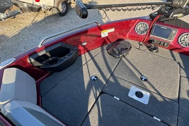 Slide: The Image of 2023 Skeeter Solera 189 boat interior with red accents and advanced navigation equipment. - 20