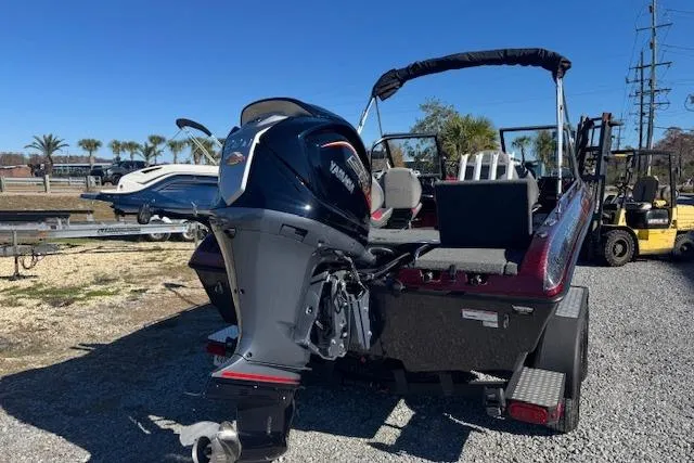 Slide: The Image of 2023 Skeeter Solera 189 boat with Yamaha outboard motor, parked outdoors. - 8