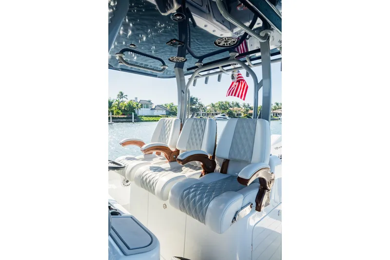 Slide: The Image of Luxurious seating on 2025 Costa Custom Boats 34, featuring elegant design and craftsmanship. - 19