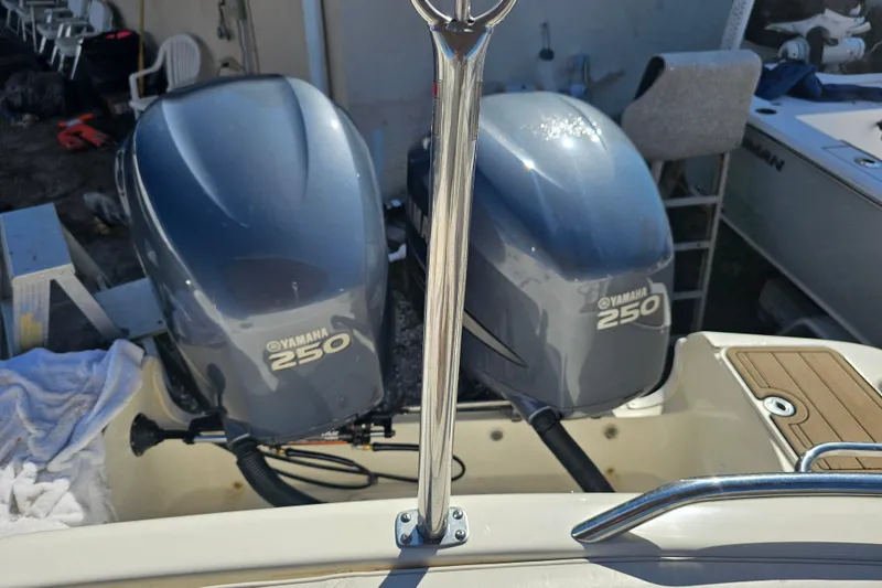 Slide: The Image of 2006 Hurricane SunDeck 260 OB with dual Yamaha 250 outboard engines. - 9