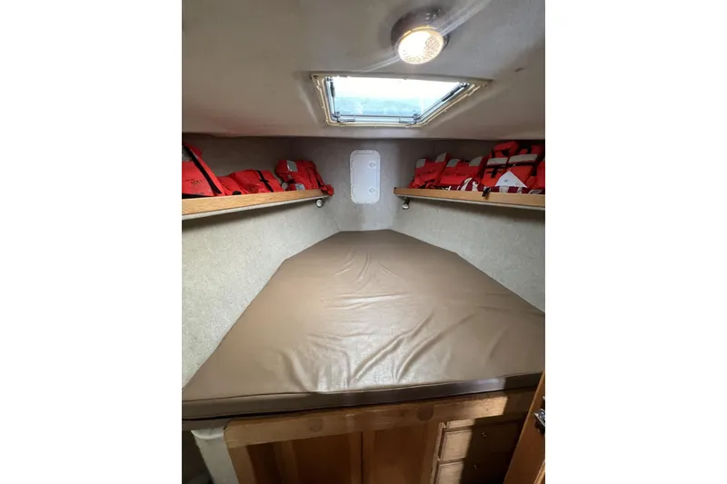 Slide: The Image of Interior cabin of 2006 Provincial 42 Lobster Boat with life jackets and skylight. - 24