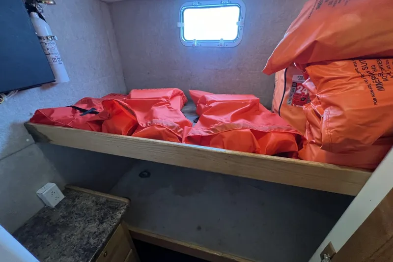 Slide: The Image of Interior of 2006 Provincial 42 Lobster Boat with life jackets and fire extinguisher. - 29