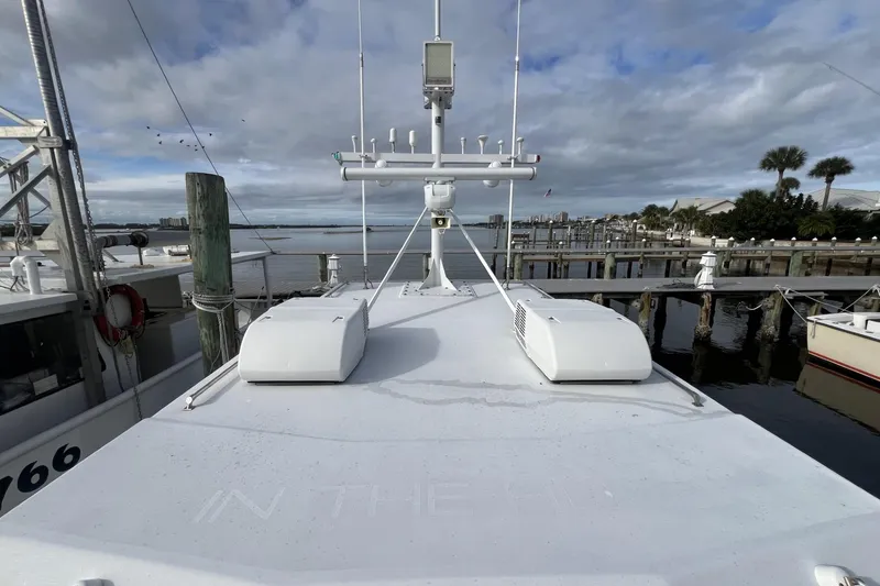Slide: The Image of 2006 Provincial 42 Lobster Boat docked at marina under cloudy sky. - 6