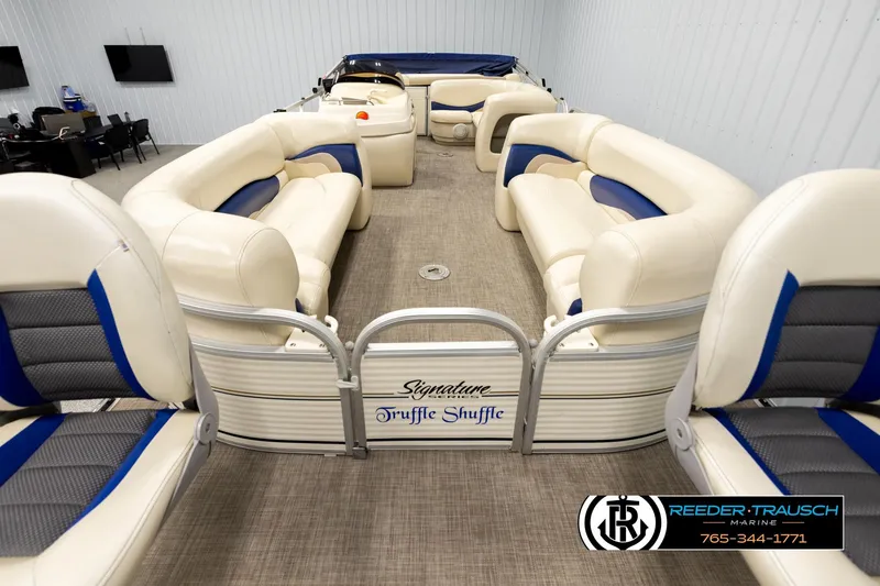 Slide: The Image of 2008 Sun Tracker Party Barge 24 with spacious seating and modern interior design. - 12