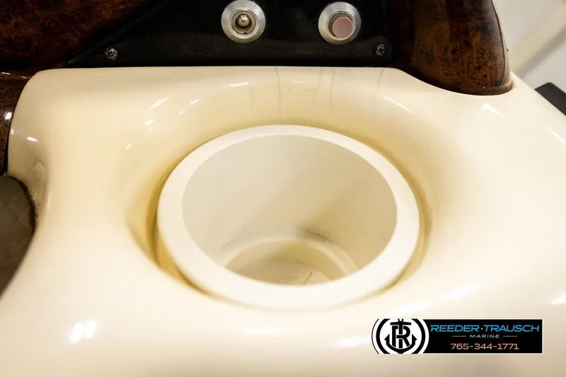 Slide: The Image of Cup holder on 2008 Sun Tracker Party Barge 24 boat console. - 24