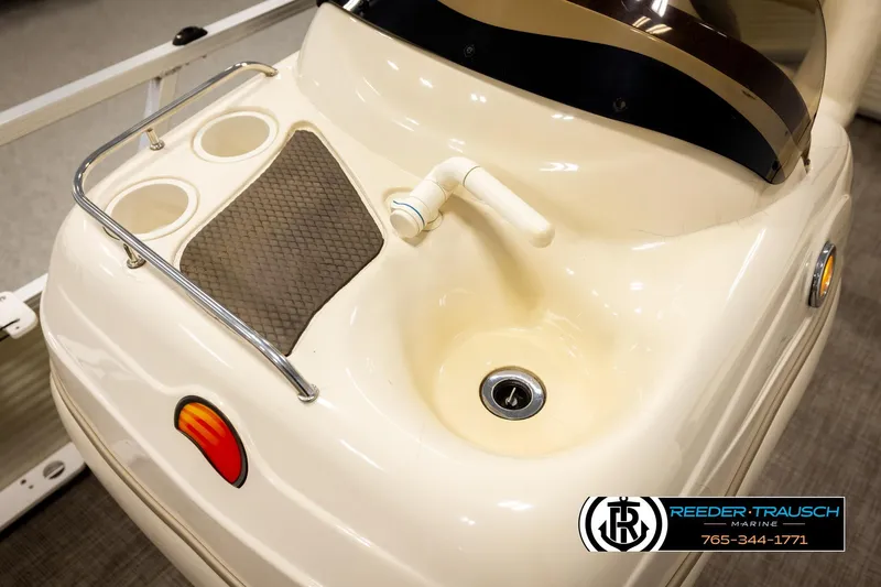 Slide: The Image of 2008 Sun Tracker Party Barge 24 boat sink and cup holders detail. - 31