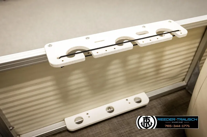 Slide: The Image of 2008 Sun Tracker Party Barge 24 interior detail with custom accessory holder. - 33