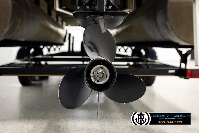 Slide: The Image of Close-up of a 2008 Sun Tracker Party Barge 24 propeller on a trailer. - 38