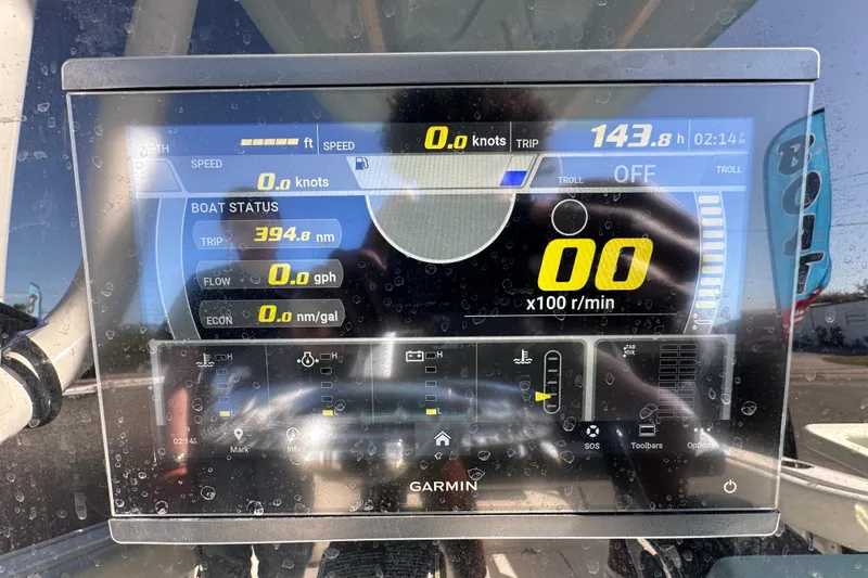 Slide: The Image of 2023 Tidewater 210 CC Adventure boat interior with seating and storage compartments. - 13