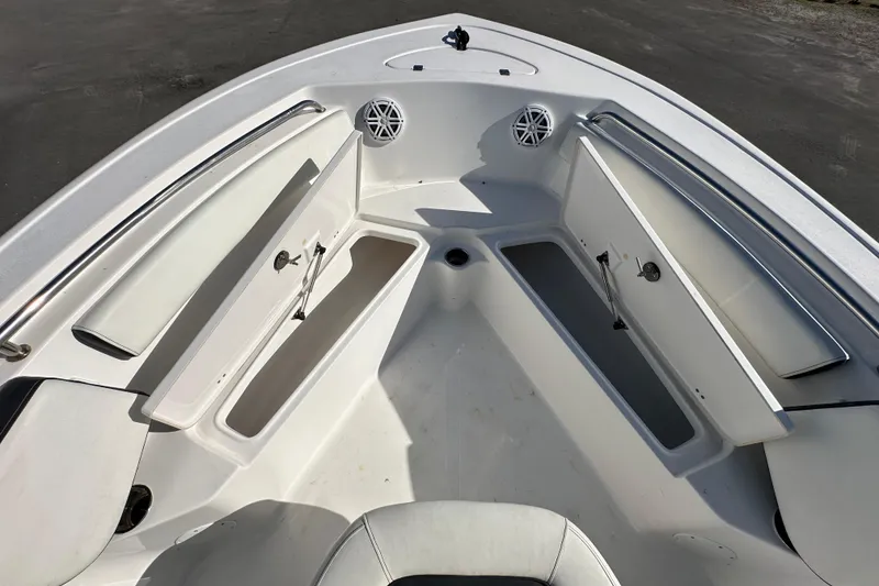 Slide: The Image of Tidewater 210 CC Adventure 2023 boat top view against blue sky. - 22