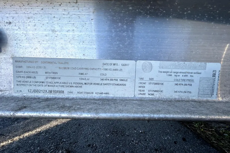 Slide: The Image of Label on Continental Trailers boat trailer, detailing specifications and safety standards. - 67