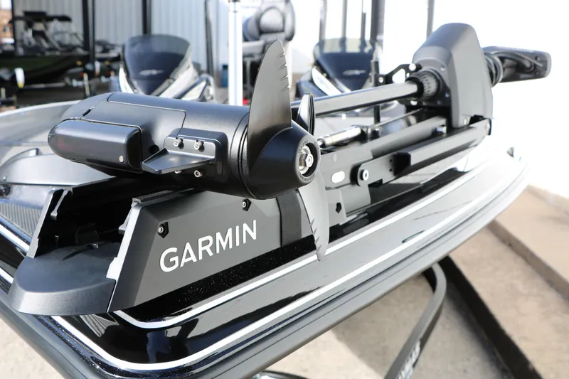 Slide: The Image of 2025 Caymas CX 21 PRO boat with Garmin trolling motor, close-up view. - 17