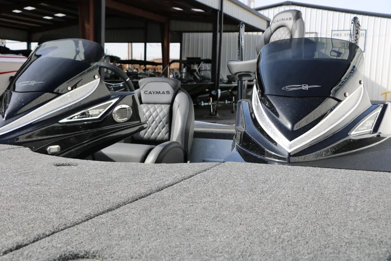 Slide: The Image of 2025 Caymas CX 21 PRO boat interior with sleek design and comfortable seating. - 18