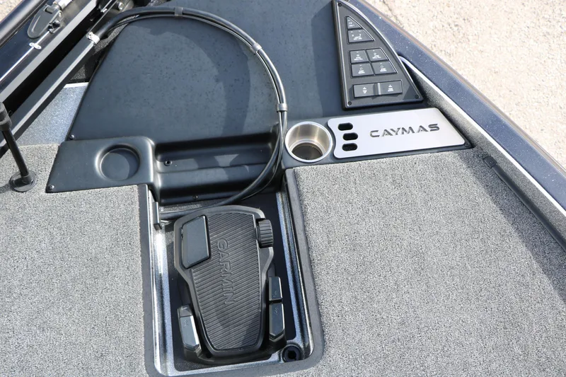 Slide: The Image of 2025 Caymas CX 21 PRO boat console with Garmin pedal and control panel. - 28