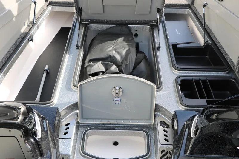 Slide: The Image of 2025 Caymas CX 21 PRO boat storage compartments and interior layout. - 33