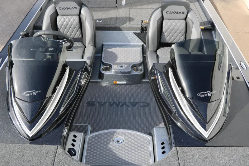 Slide: The Image of 2025 Caymas CX 21 PRO boat interior with dual seats and sleek consoles. - 34