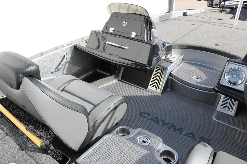 Slide: The Image of 2025 Caymas CX 21 PRO boat interior with sleek seating and modern dashboard. - 39