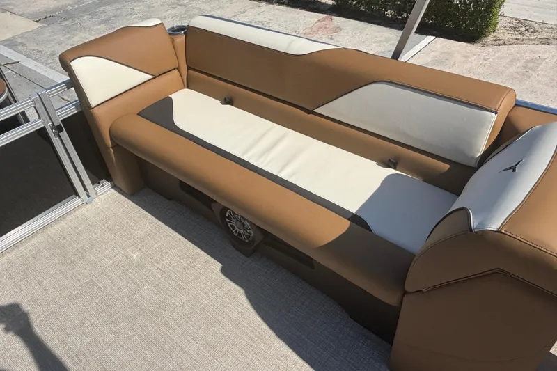 Slide: The Image of 2026 Tahoe Pontoon Sport 85 Quad Lounge with brown and cream seating. - 11