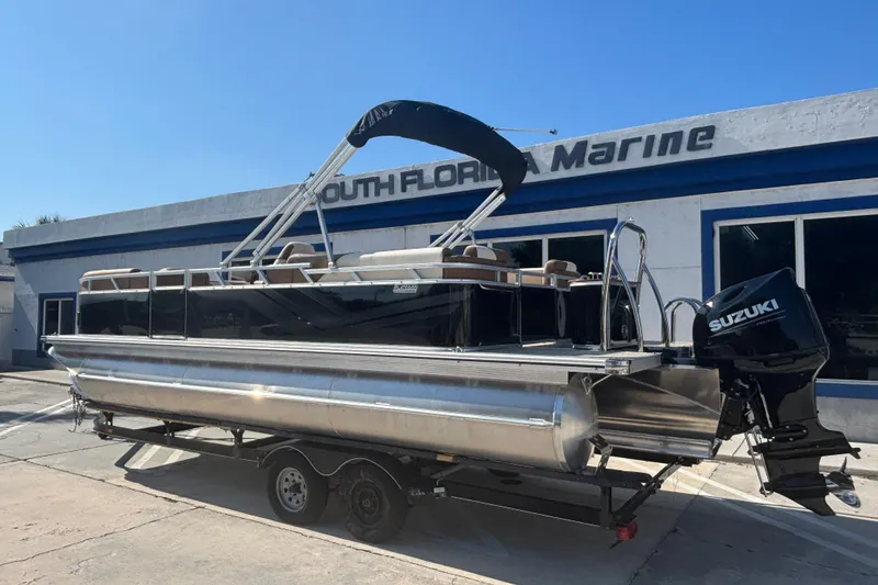 Slide: The Image of 2026 Tahoe Pontoon Sport 85 Quad Lounge at South Florida Marine dealership. - 2