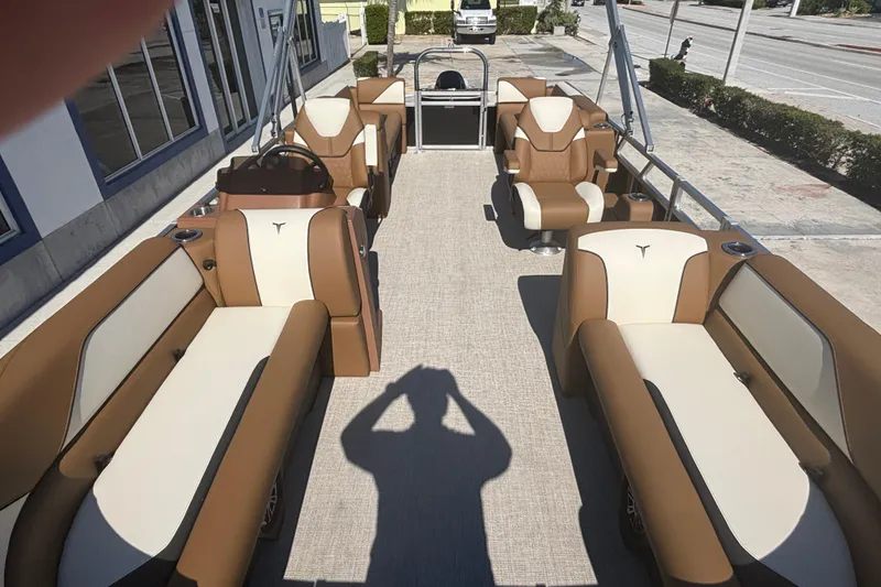 Slide: The Image of 2026 Tahoe Pontoon Sport 85 Quad Lounge with luxurious seating and modern design. - 6