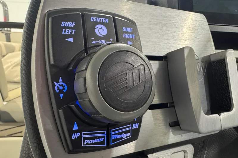 Slide: The Image of Control panel of 2019 Malibu Wakesetter 21 MLX boat with surf and power settings. - 16