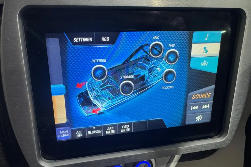 Slide: The Image of Touchscreen control panel of a 2019 Malibu Wakesetter 21 MLX boat. - 18