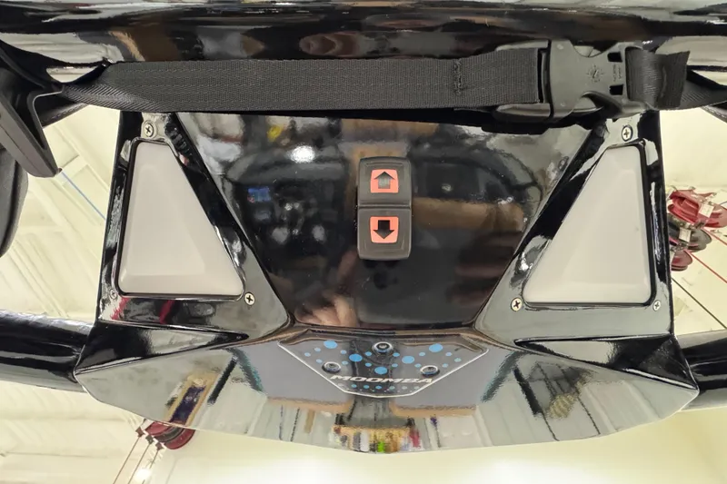 Slide: The Image of 2026 Moomba Tykon boat control panel with buttons and sleek design. - 21